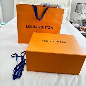 Louis Vuitton Monogram Rivoli MM